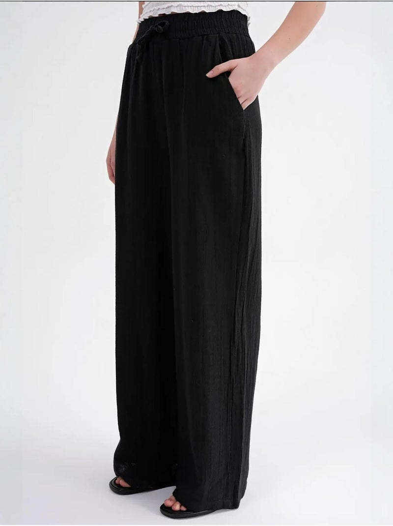 Pantaloni a vita alta in mussola testurizzata mixray Nero - Kiabi