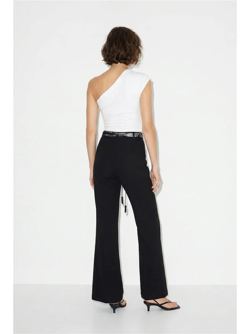 Pantaloni a zampa a vita alta con cintura lucci Nero - Kiabi