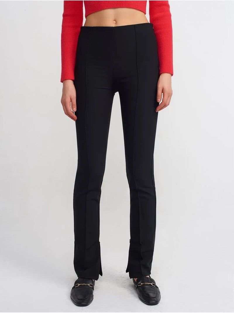 Pantaloni a zampa a vita alta con spacco Nero - Kiabi