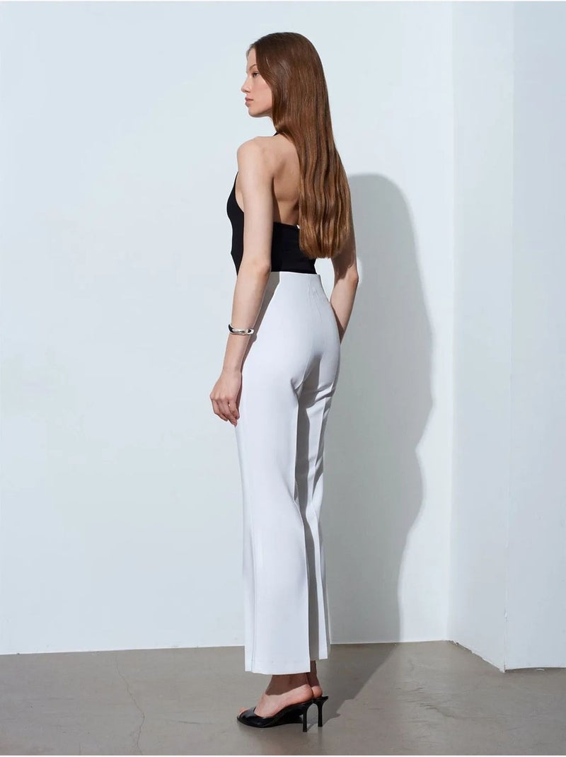 Pantaloni a zampa a vita alta da donna Bianco - Kiabi