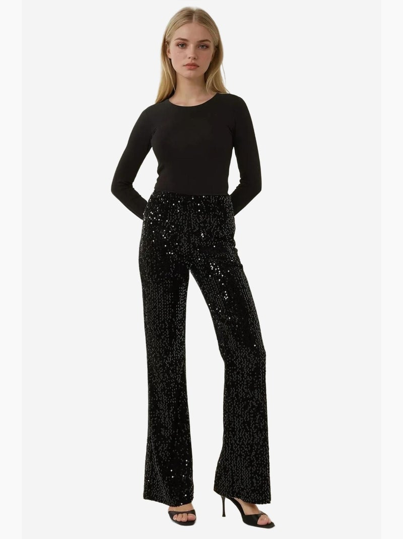 Pantaloni a zampa con paillettes hiccup Nero - Kiabi
