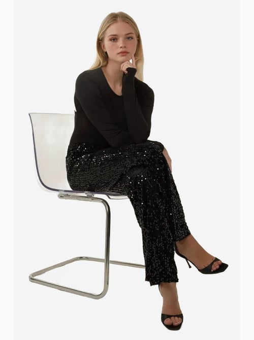 Pantaloni a zampa con paillettes hiccup - Kiabi Pantaloni a zampa con paillettes hiccup - Kiabi