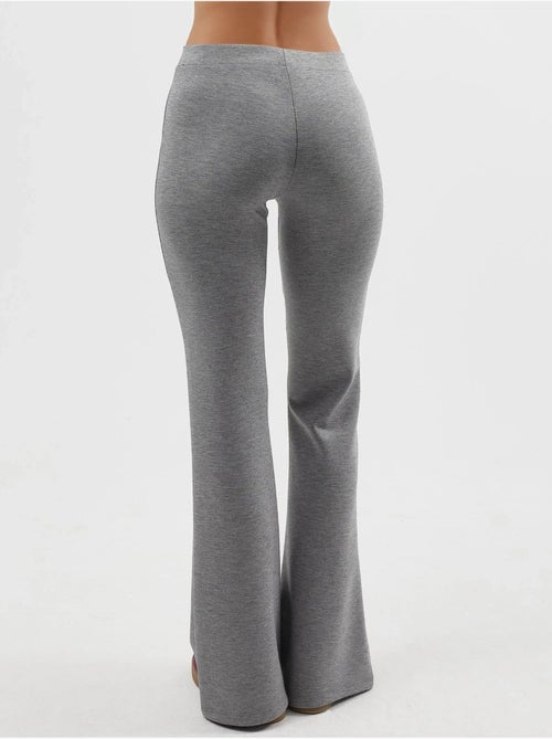 Pantaloni a zampa elasticizzati a coste busem - Kiabi Pantaloni a zampa elasticizzati a coste busem - Kiabi