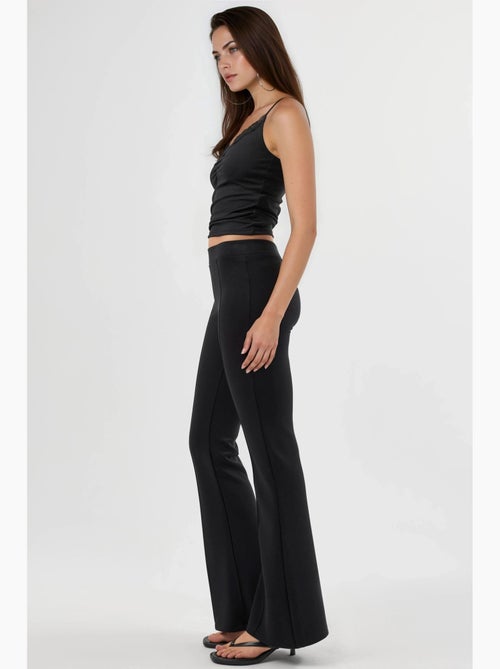 Pantaloni a zampa elasticizzati a coste busem - Kiabi Pantaloni a zampa elasticizzati a coste busem - Kiabi