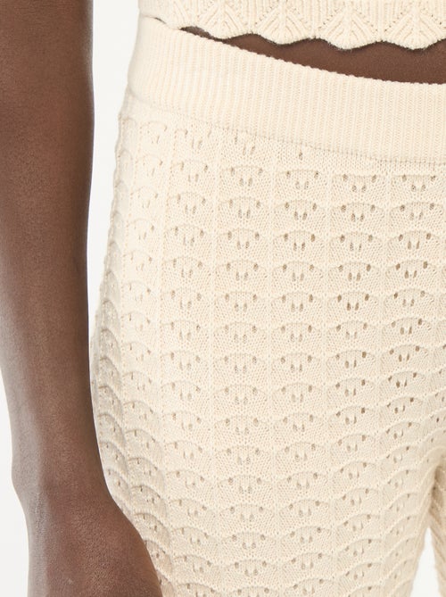 Pantaloni a zampa in crochet - Kiabi