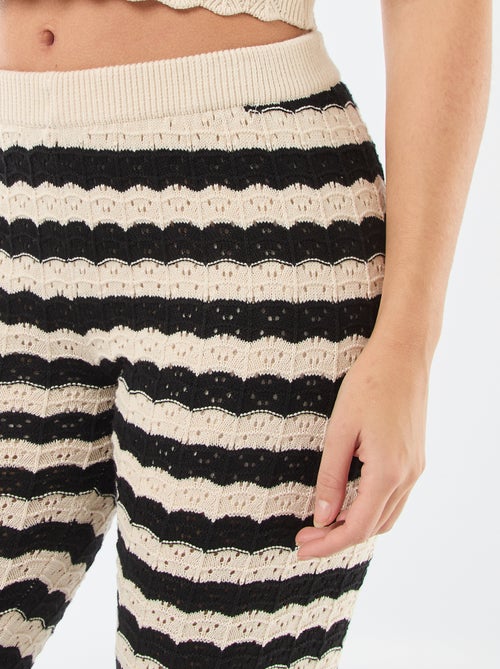 Pantaloni a zampa in crochet - Kiabi