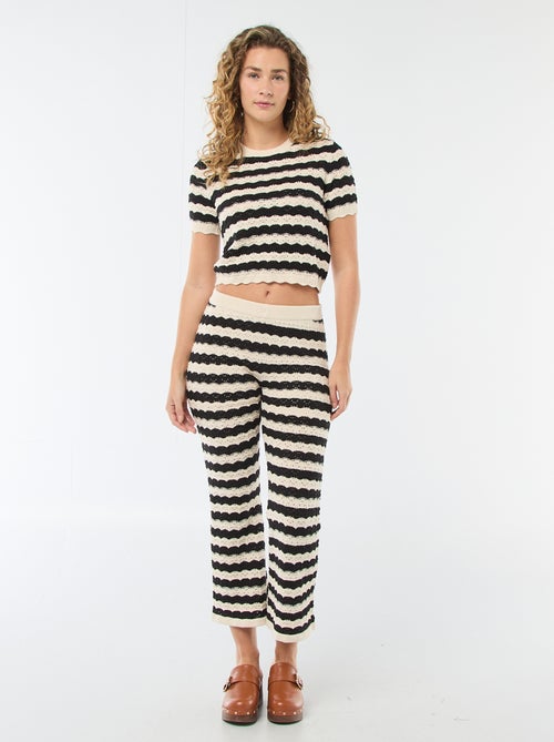 Pantaloni a zampa in crochet - Kiabi