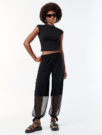 Pantaloni ampi a palloncino con bordo in pizzo