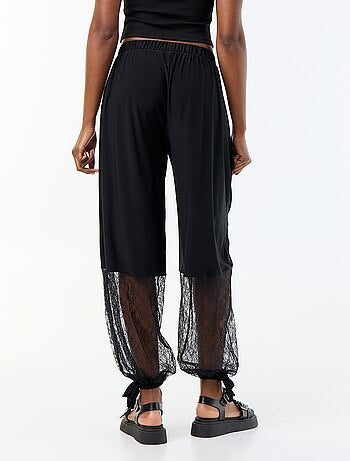 Pantaloni ampi a palloncino con bordo in pizzo