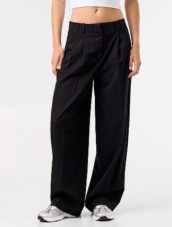 Pantaloni ampi a vita alta