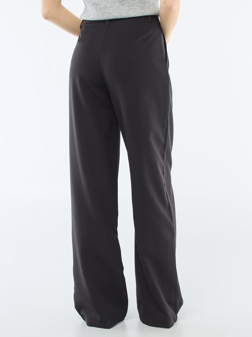 Pantaloni ampi con apertura asimmetrica - Kiabi