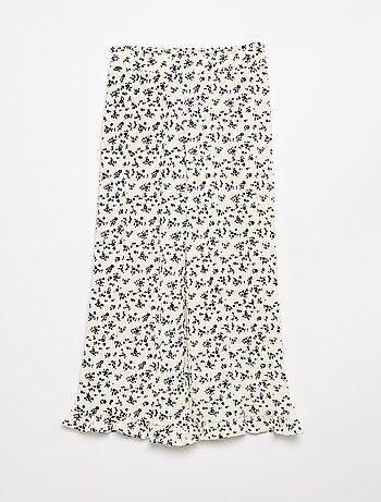Pantaloni ampi con balze sul fondo