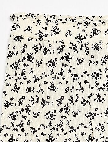Pantaloni ampi con balze sul fondo