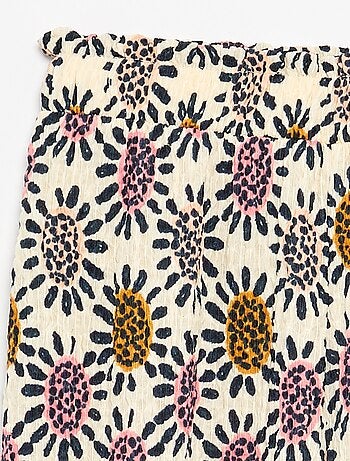 Pantaloni ampi con balze sul fondo
