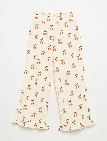 Pantaloni ampi con balze sul fondo