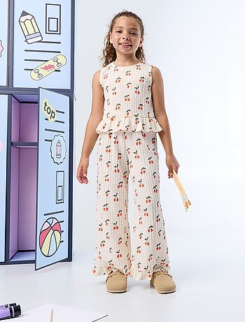 Pantaloni ampi con balze sul fondo