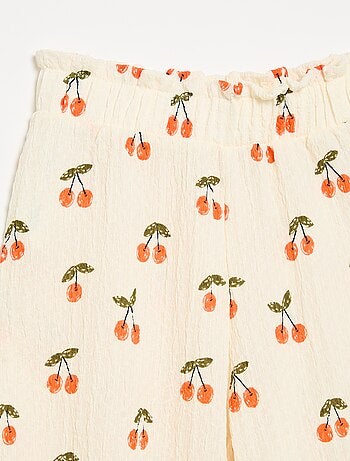 Pantaloni ampi con balze sul fondo