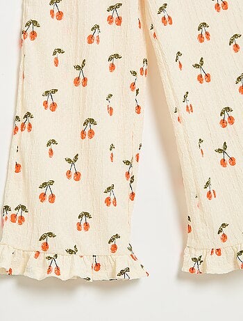 Pantaloni ampi con balze sul fondo
