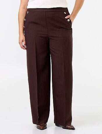 Pantaloni ampi con bottoni dorati fantasia
