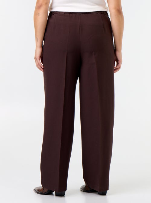 Pantaloni ampi con bottoni dorati fantasia - Kiabi