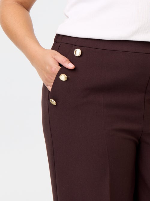 Pantaloni ampi con bottoni dorati fantasia - Kiabi