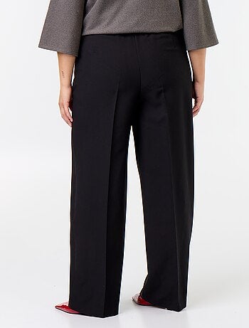 Pantaloni ampi con bottoni dorati fantasia