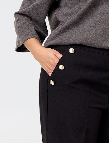 Pantaloni ampi con bottoni dorati fantasia