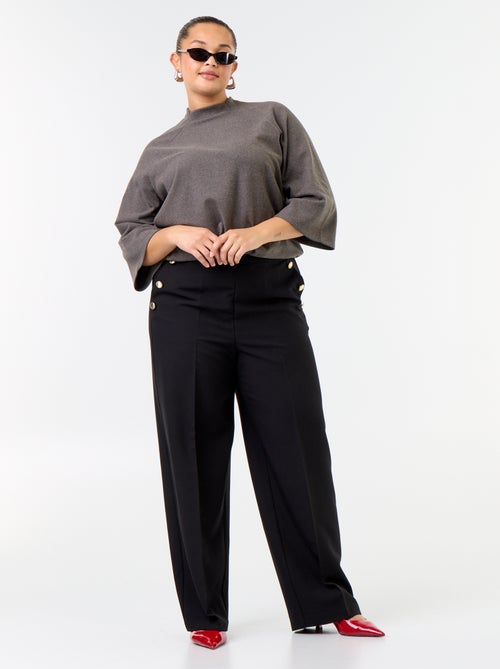 Pantaloni ampi con bottoni dorati fantasia - Kiabi Pantaloni ampi con bottoni dorati fantasia - Kiabi