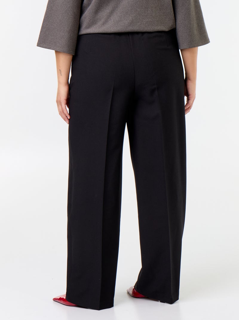 Pantaloni ampi con bottoni dorati fantasia Nero - Kiabi