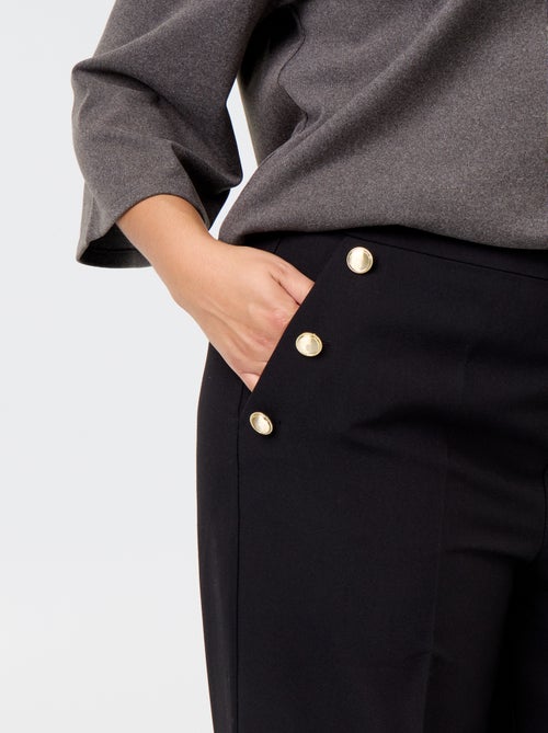Pantaloni ampi con bottoni dorati fantasia - Kiabi Pantaloni ampi con bottoni dorati fantasia - Kiabi