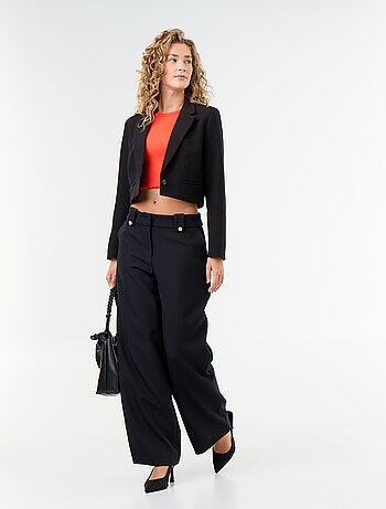 Pantaloni ampi con bottoni dorati