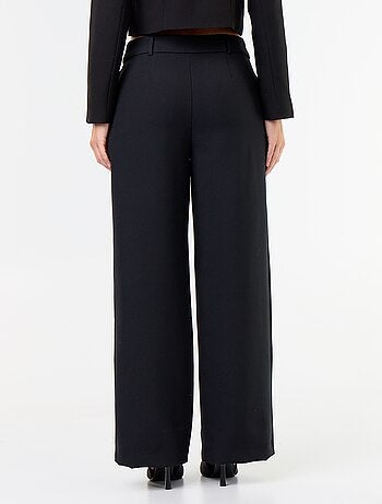 Pantaloni ampi con bottoni dorati