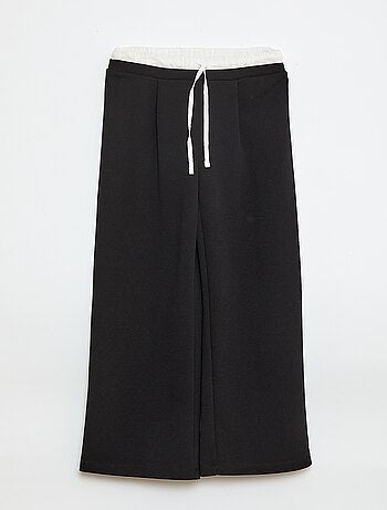 Pantaloni ampi con effetto 2 in 1 stile shorts