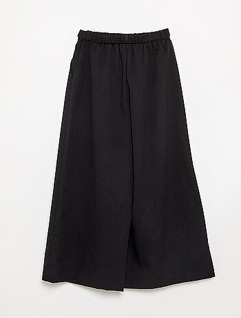 Pantaloni ampi con fibbia in vita