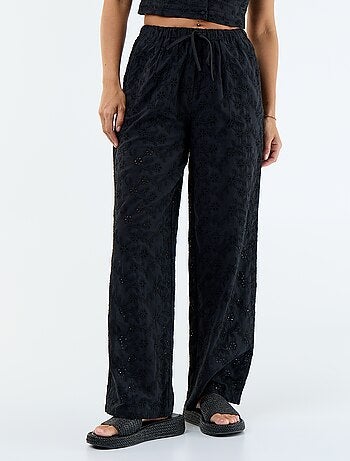 Pantaloni ampi con ricamo inglese in cotone tinta unita