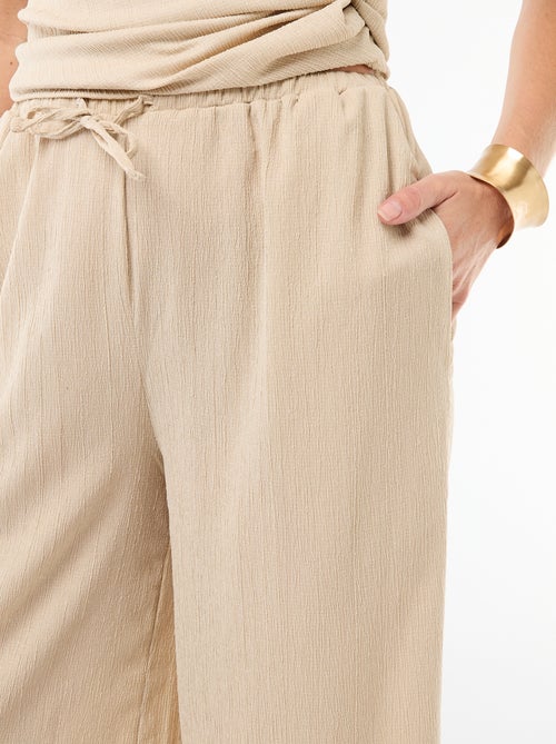 Pantaloni ampi crêpe con 2 tasche - Kiabi