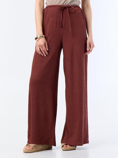 Pantaloni ampi crêpe con 2 tasche - Kiabi Pantaloni ampi crêpe con 2 tasche - Kiabi