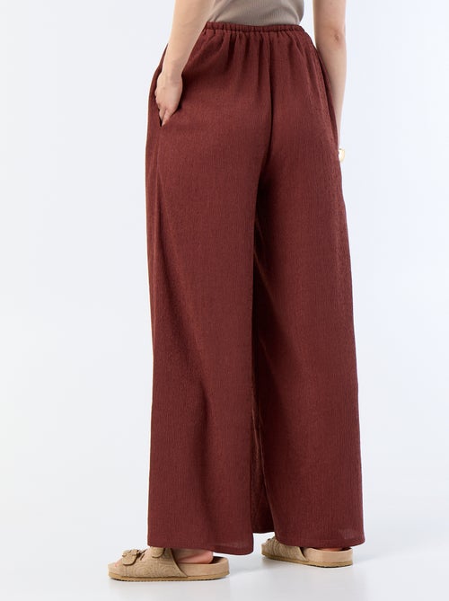 Pantaloni ampi crêpe con 2 tasche - Kiabi Pantaloni ampi crêpe con 2 tasche - Kiabi