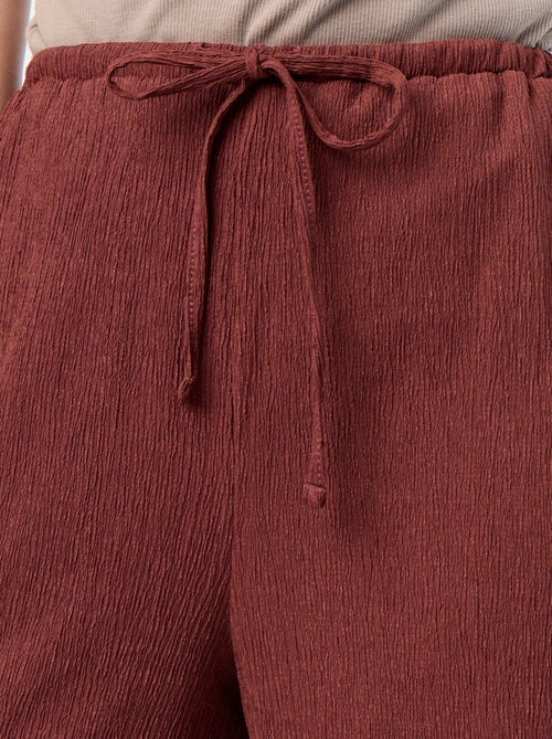 Pantaloni ampi crêpe con 2 tasche - Kiabi Pantaloni ampi crêpe con 2 tasche - Kiabi