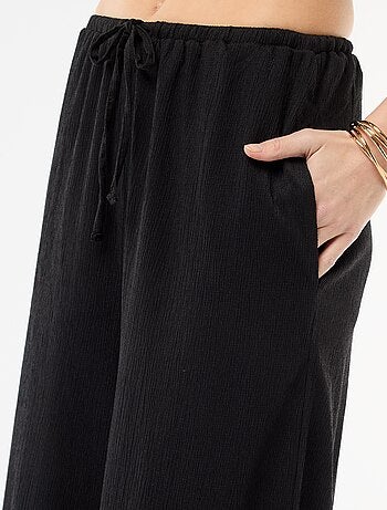 Pantaloni ampi crêpe con 2 tasche