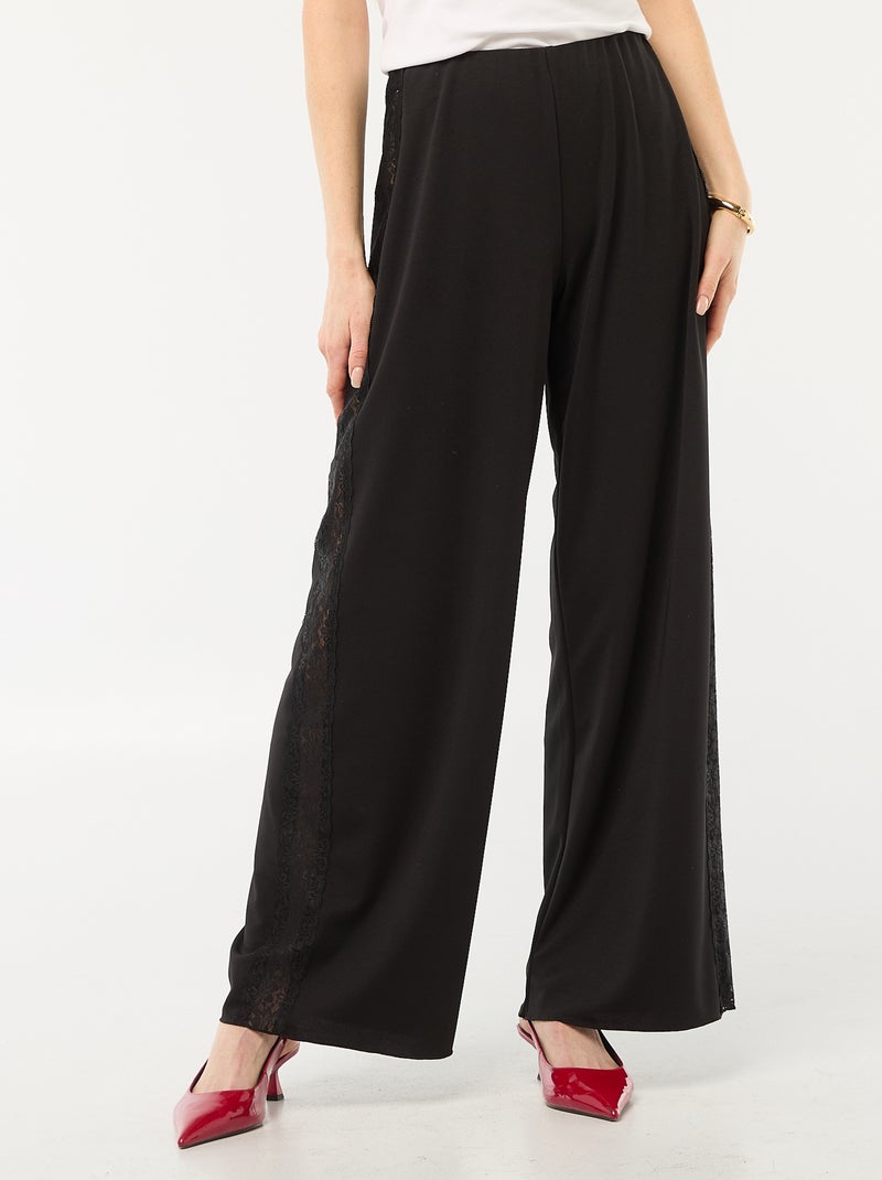 Pantaloni ampi e fluidi con bande laterali in pizzo Nero - Kiabi