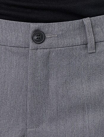 Pantalone ampio a vita alta con cintura e passanti
