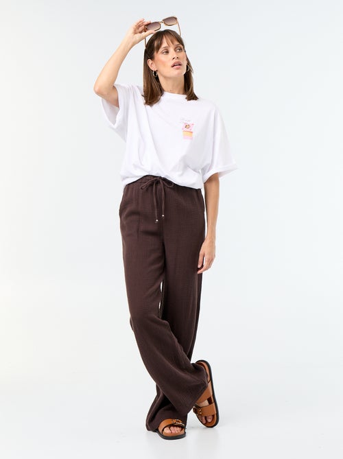 Pantaloni ampi in garza di cotone - Kiabi Pantaloni ampi in garza di cotone - Kiabi