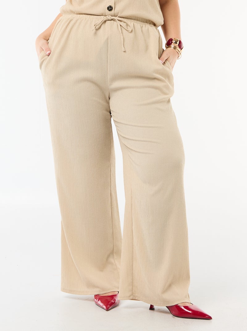 Pantaloni ampi in maglia crêpe Beige - Kiabi