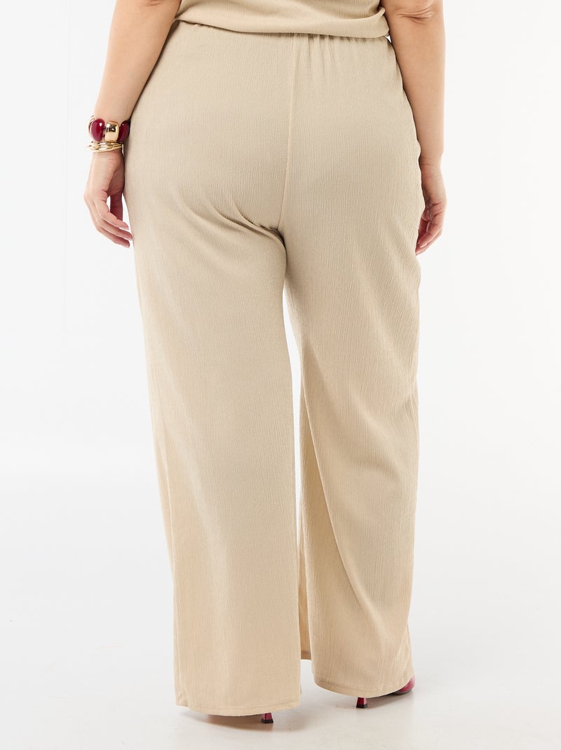 Pantaloni ampi in maglia crêpe Beige - Kiabi