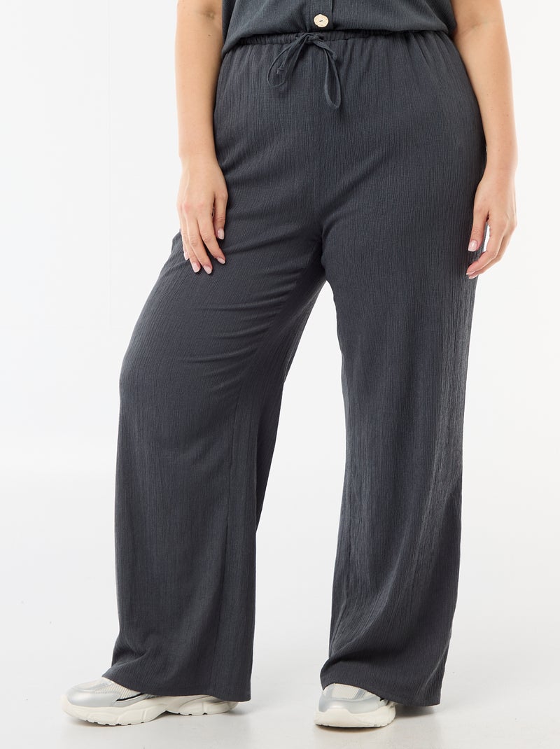 Pantaloni ampi in maglia crêpe Grigio - Kiabi
