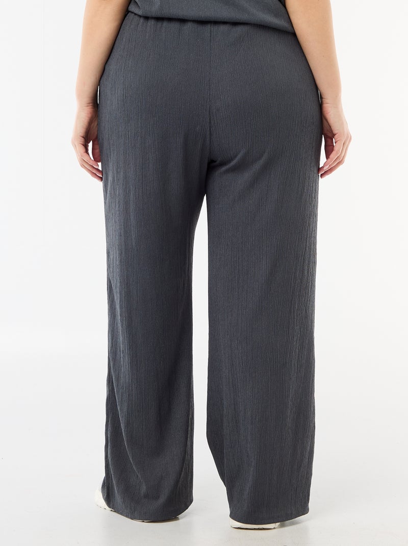 Pantaloni ampi in maglia crêpe Grigio - Kiabi