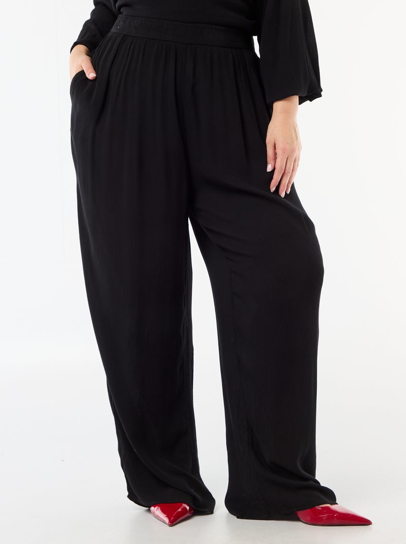 Pantaloni ampi in maglia crêpe Nero - Kiabi