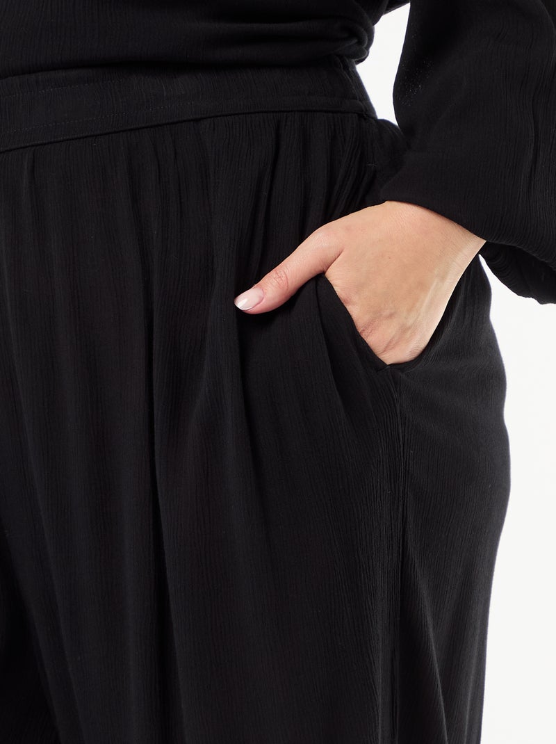 Pantaloni ampi in maglia crêpe Nero - Kiabi