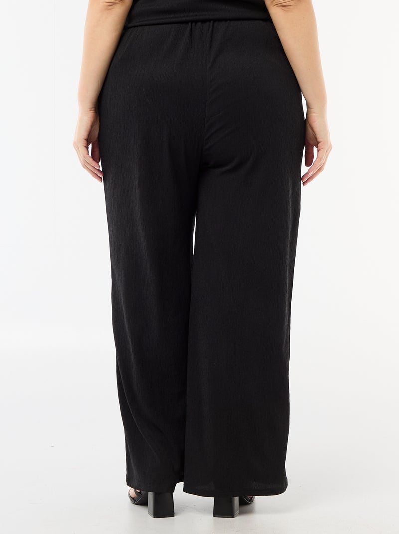 Pantaloni ampi in maglia crêpe Nero - Kiabi
